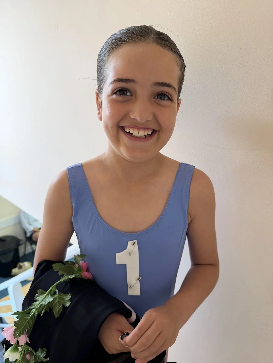 A happy moment celebrating a young dancer’s success